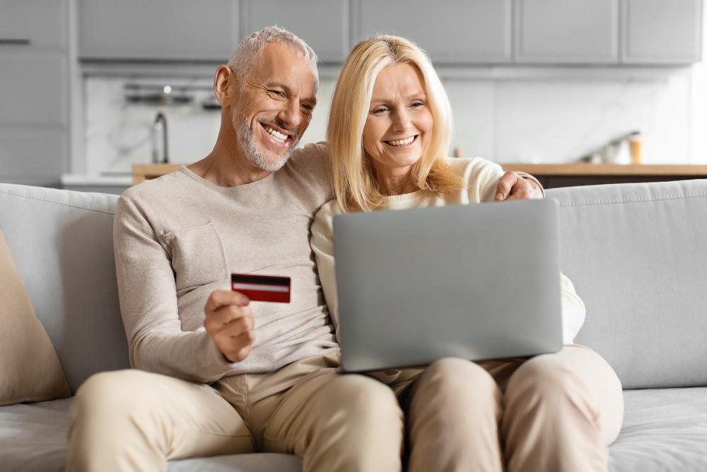 Happy couple shopping online
