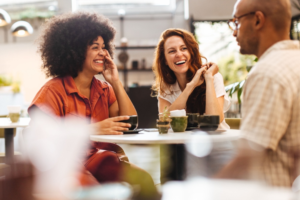 A group of friends talking in a café.