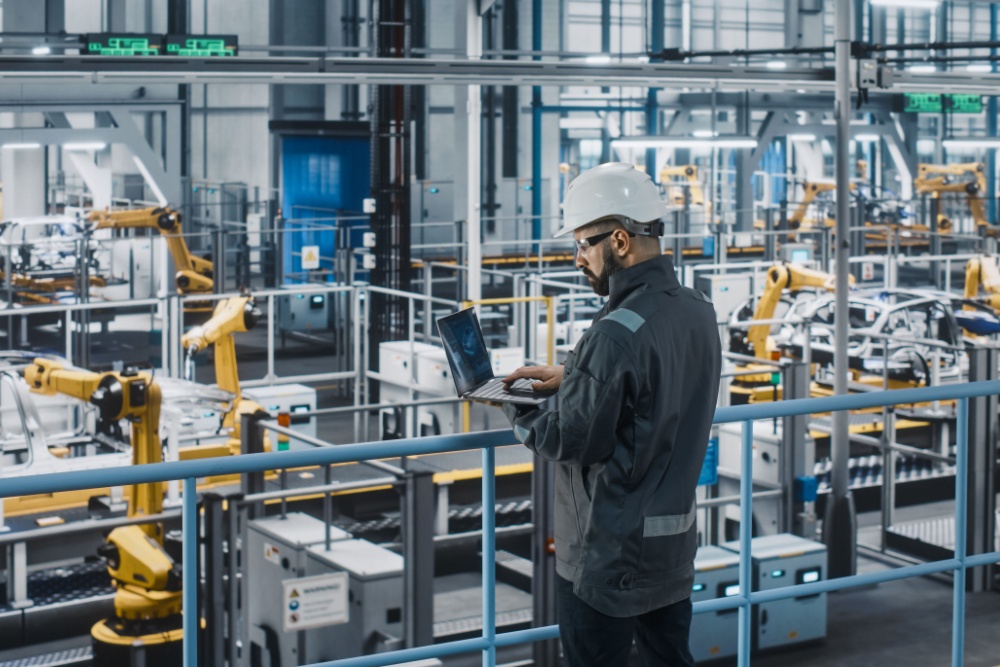 A worker in a car factory.