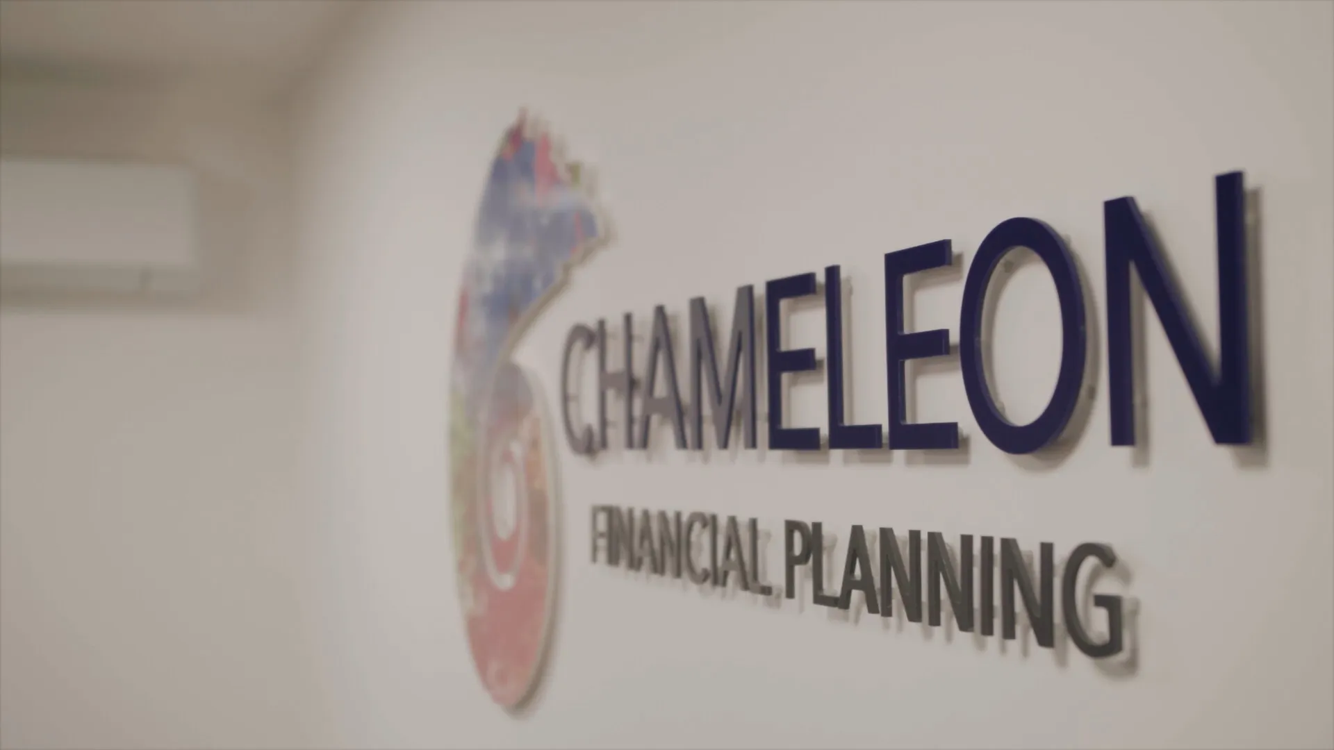 Person reviewing investment statements at home, planning their financial future