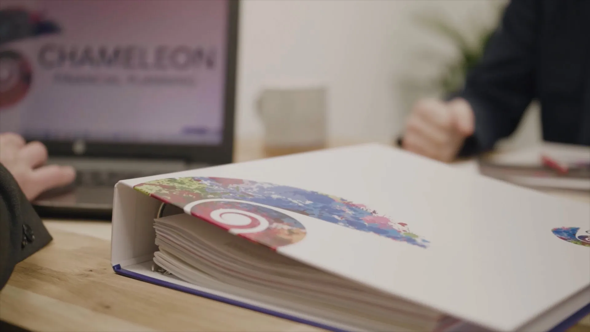 Business owner at a desk reviewing financial documents